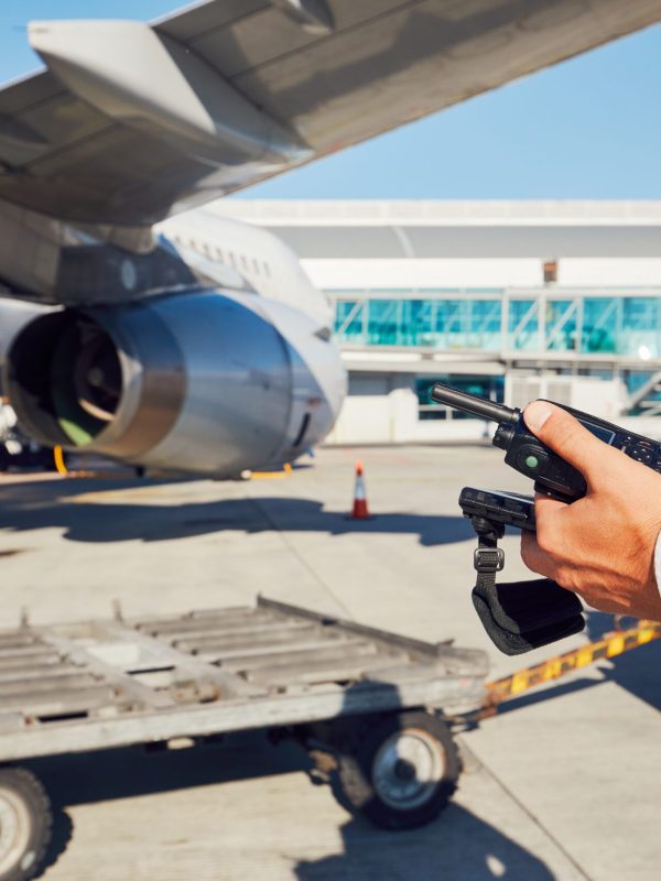 Ground staff preparing the passenger airplane before flight.